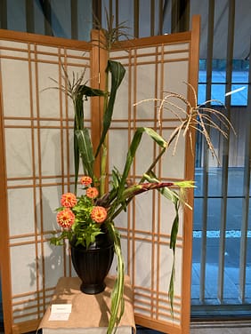 ikebana arrangement featuring corn