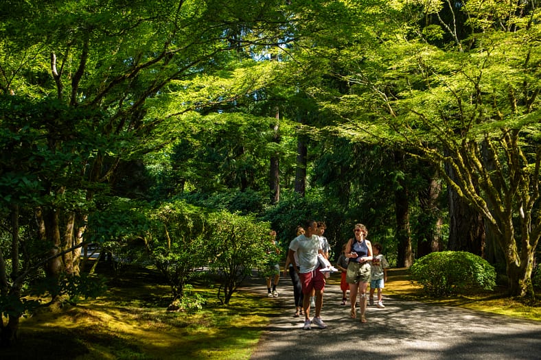 A family walking through Portland Japanese Garden