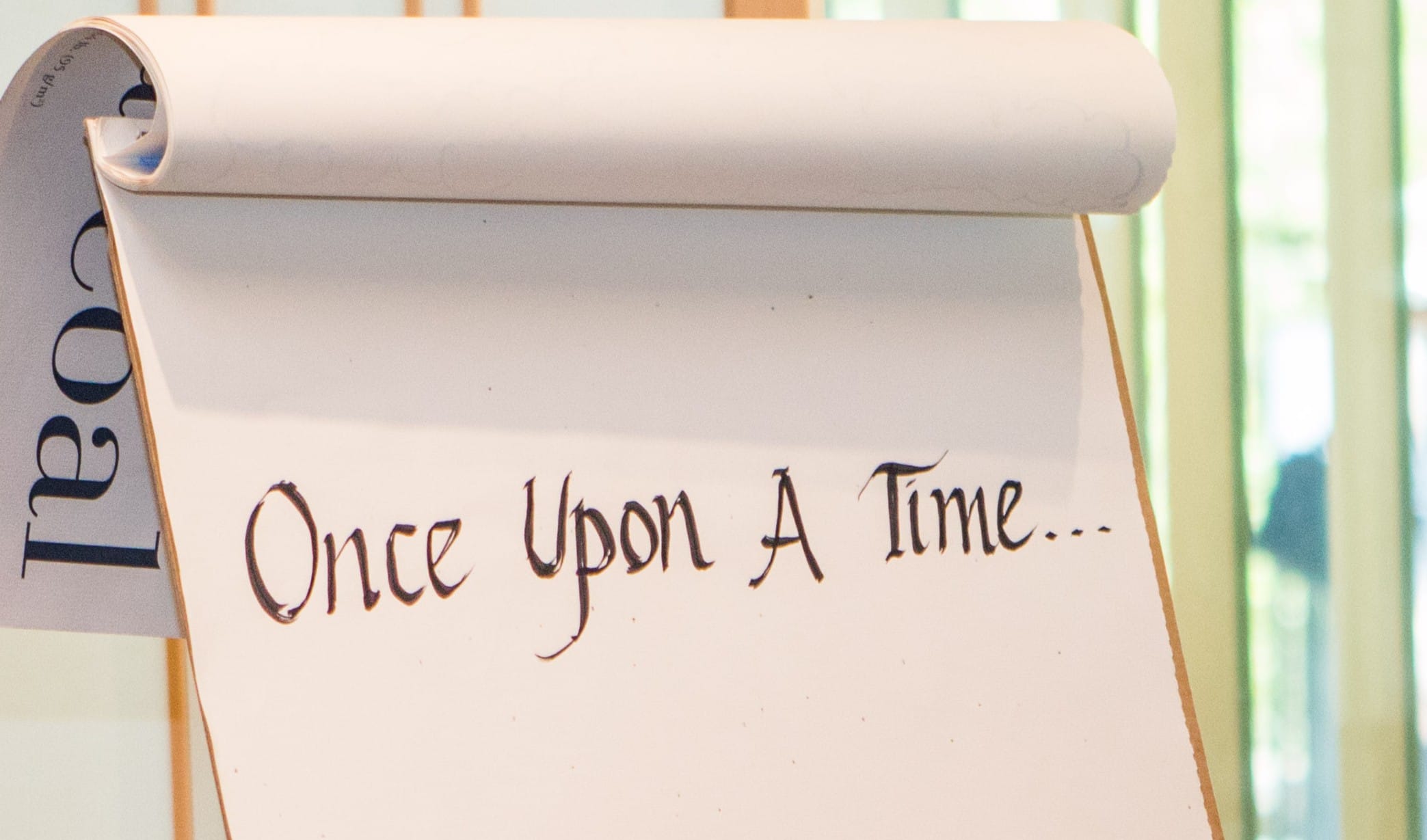 a big pad of paper that says "Once Upon a Time"