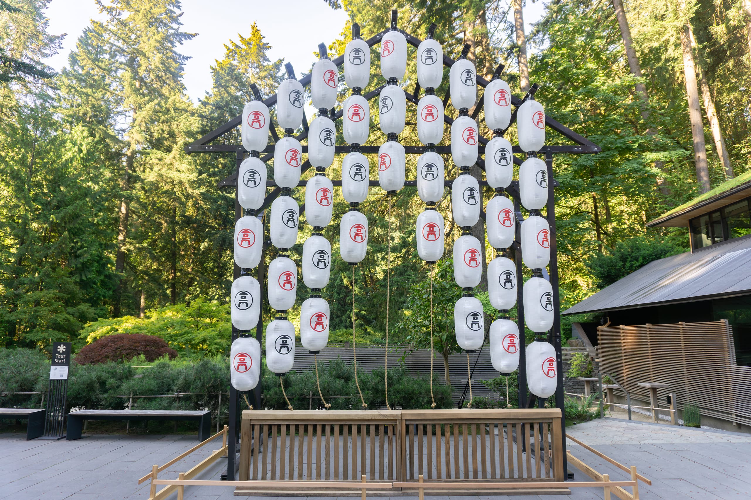 view of Japanese garden Gion Festival lanterns hanging in a courtyard