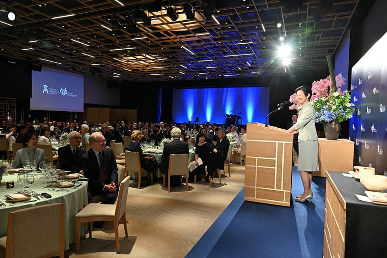 Her Imperial Highness, Princess Takamado standing at a podium delivering remarks for Portland Japanese Garden's 60th anniversary gala in Tokyo, Japan.
