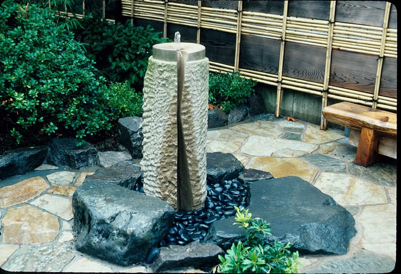 A water fountain in Portland Japanese Garden donated by The City of Sapporo.