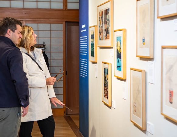 people looking at art