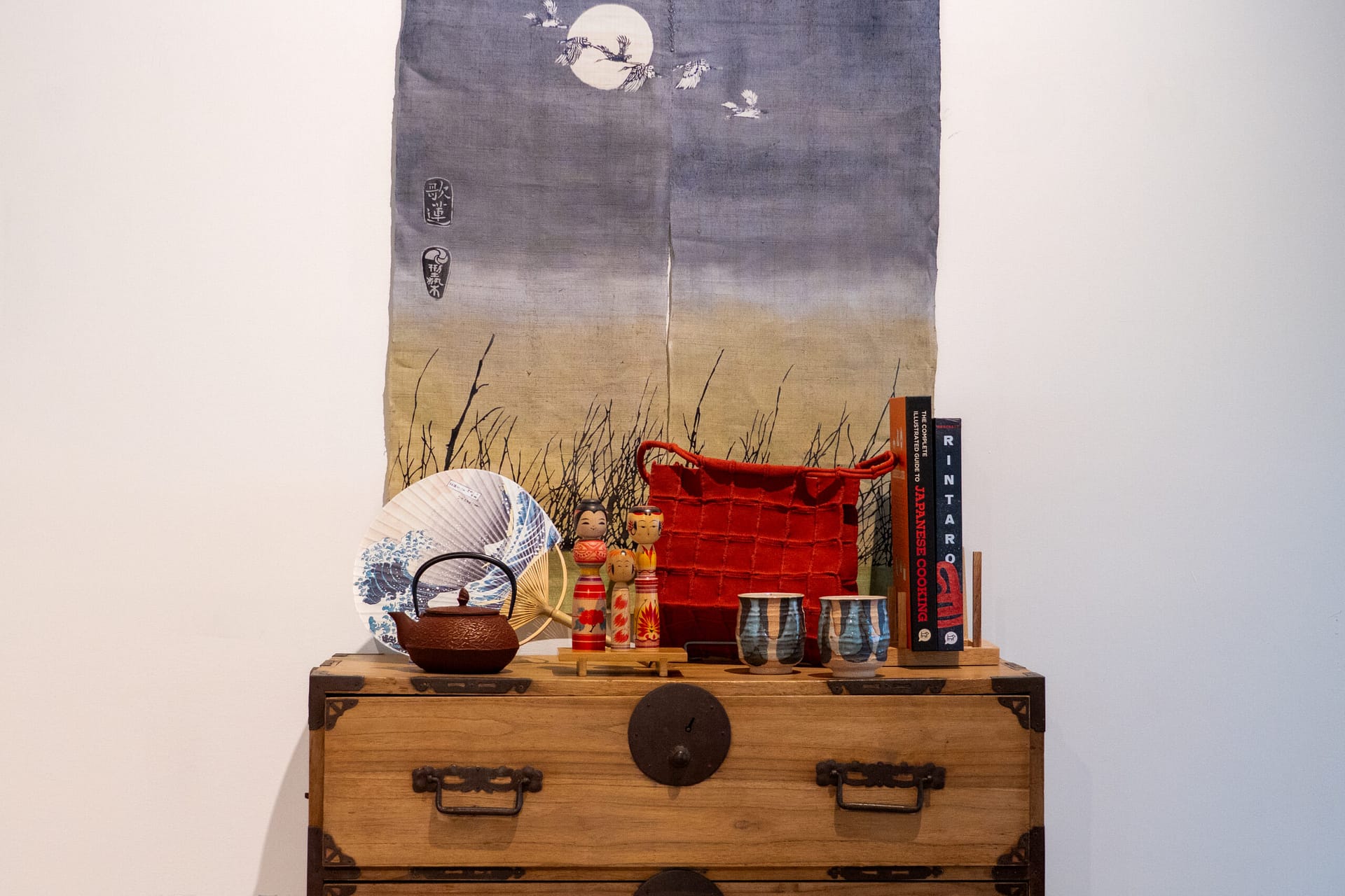 a piece of furniture with items for sale on it