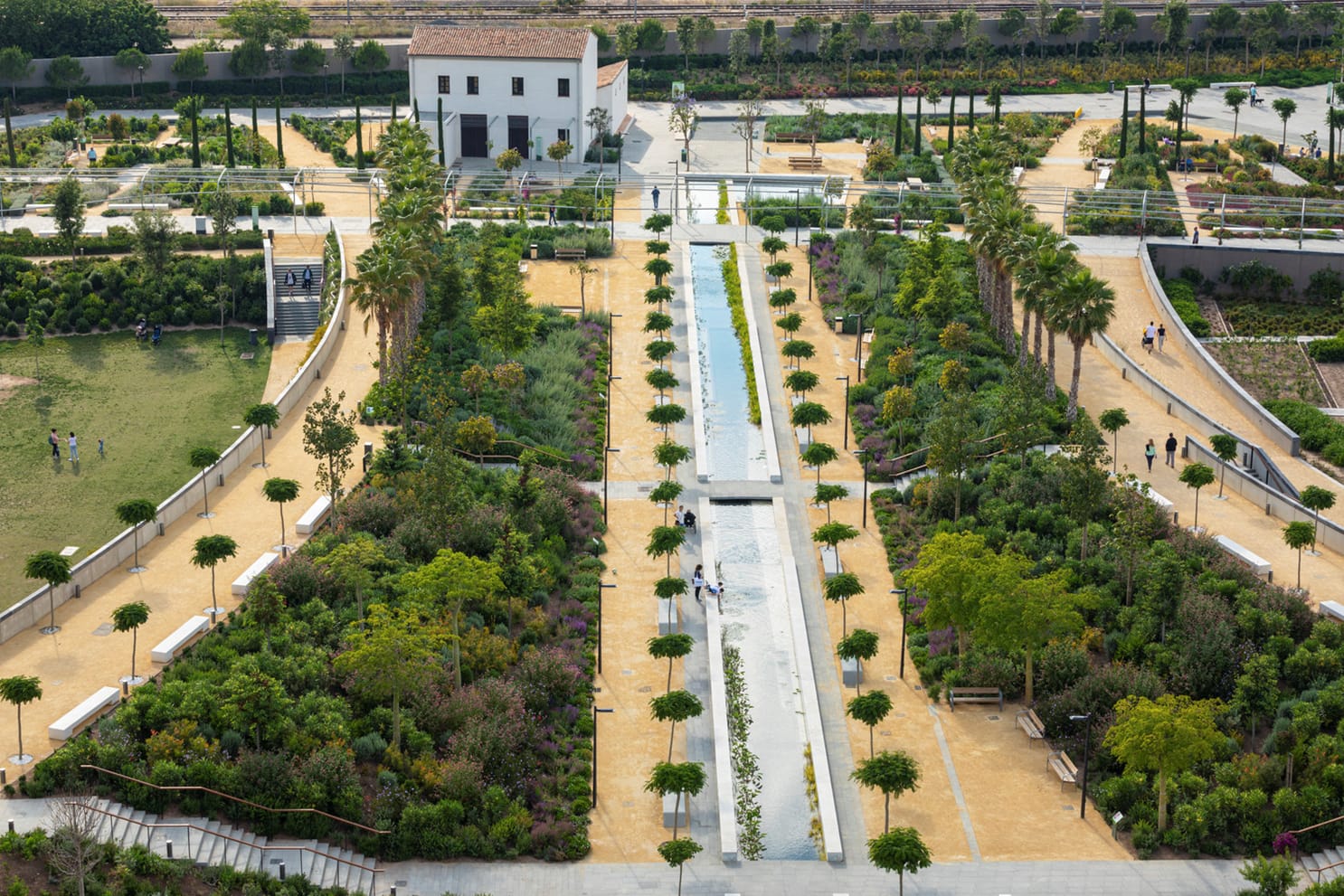 a long waterway in the middle of a park