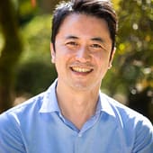 A photo of Akihito Nakanishi, Portland Japanese Garden's Arlene Schnitzer Curator of Culture, Art, and Education