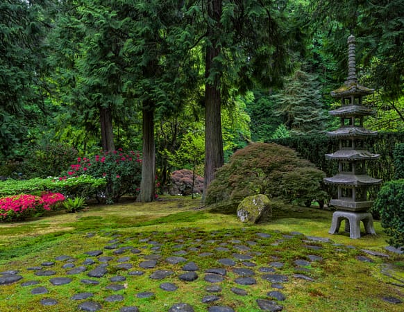 A stone lantern stylized as a pagoda tower.