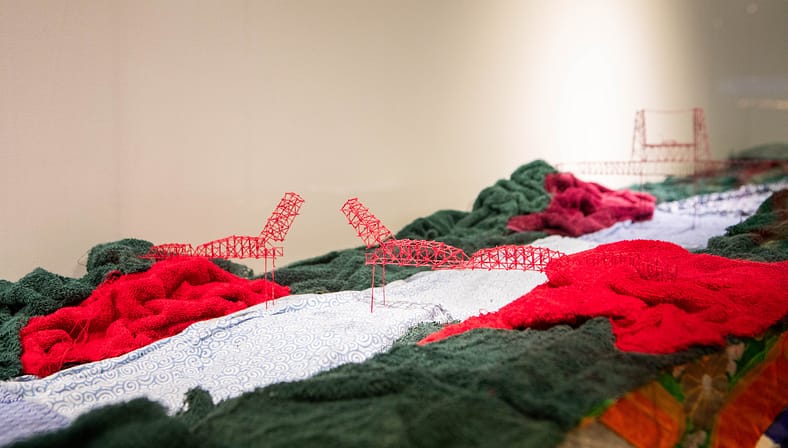 Out of Disorder depicting Hawthorne bridge on a structure of fabrics