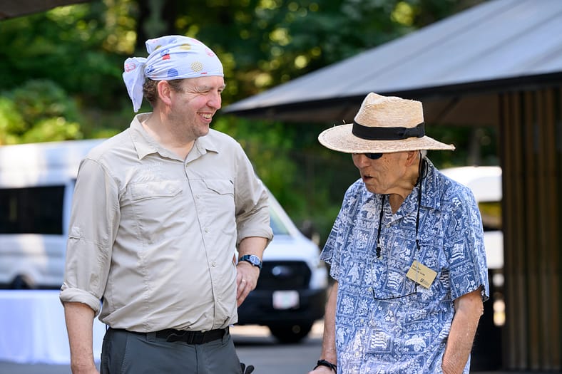 two people have a friendly conversation