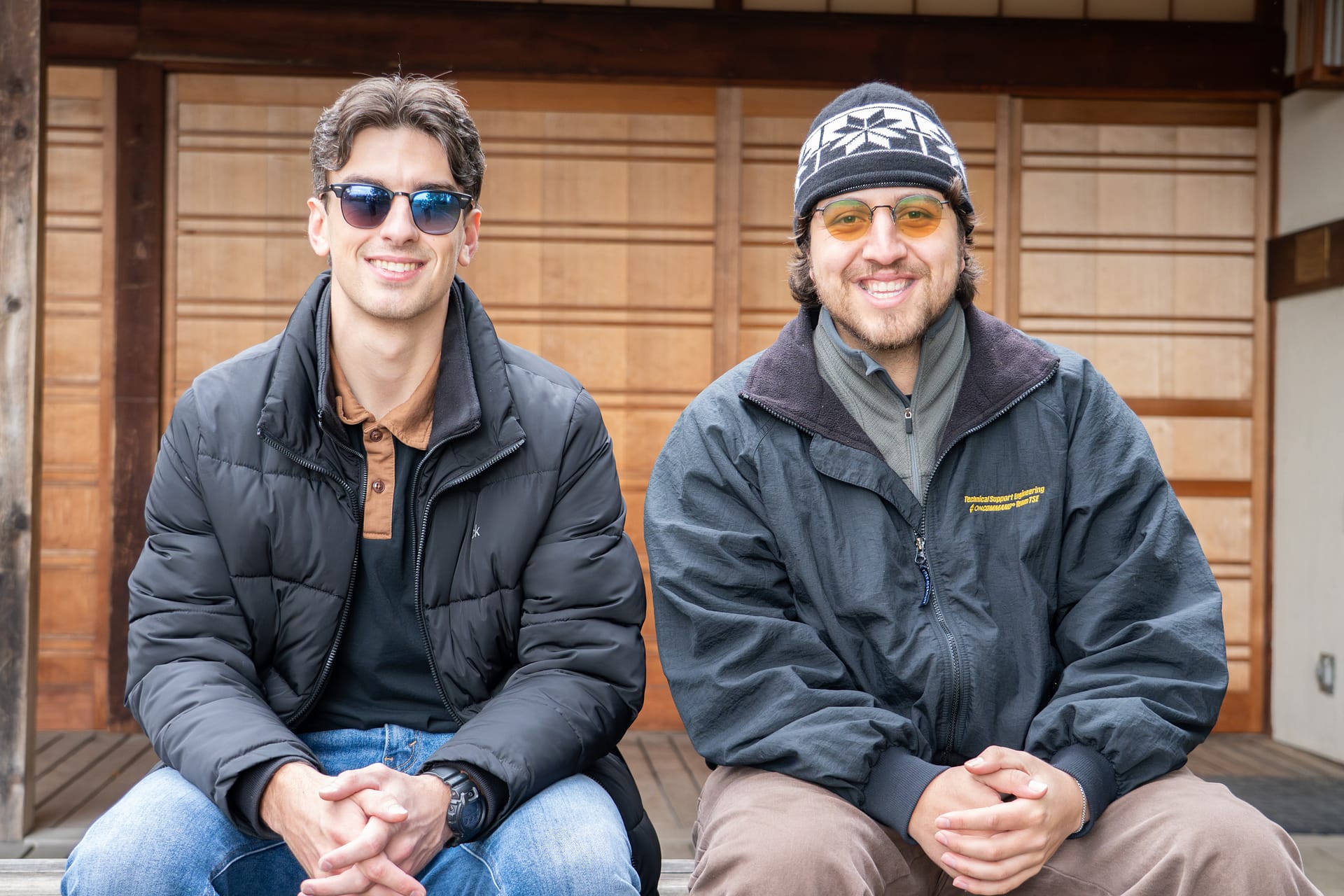two friends sitting on a bench