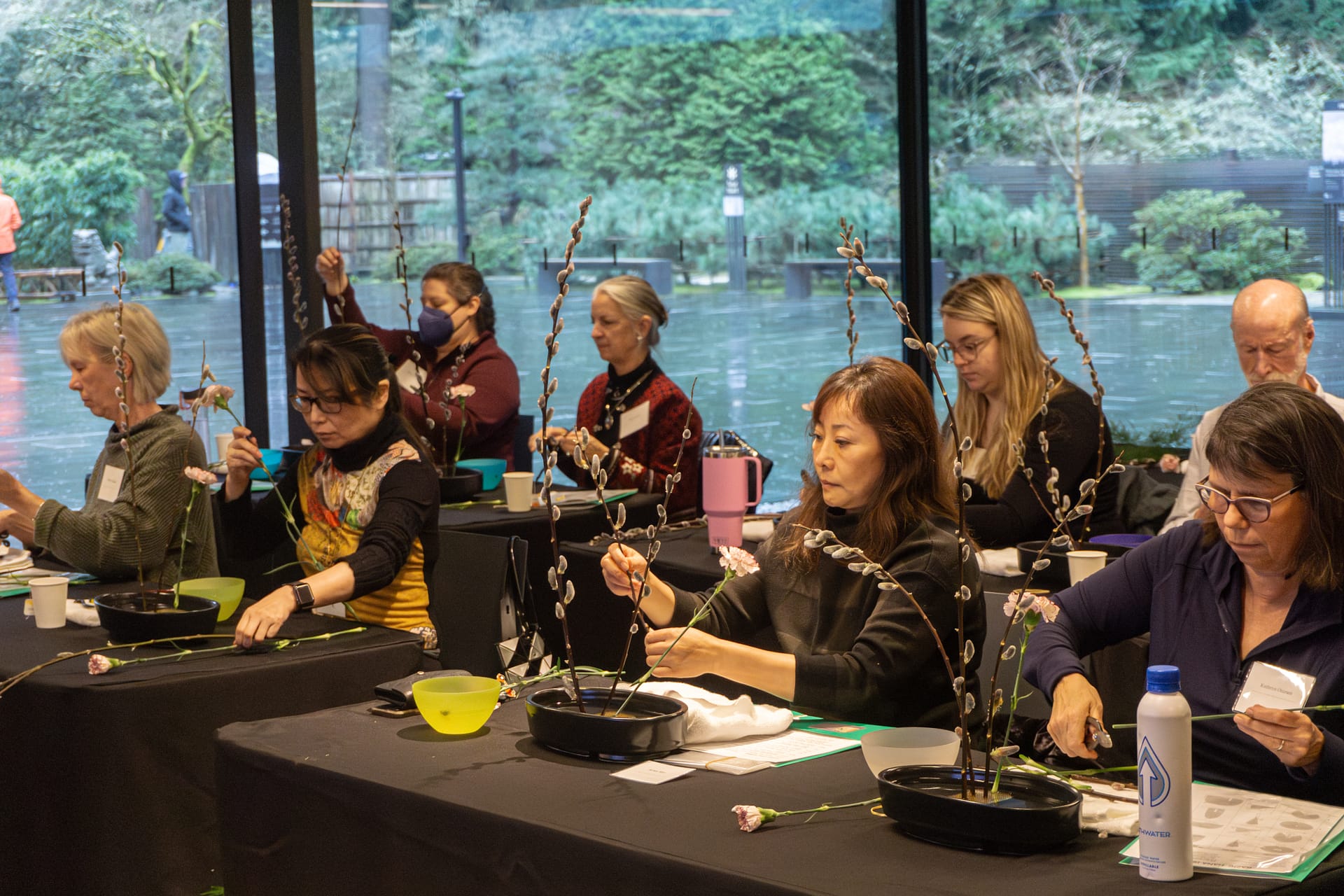 Students hard at work creating their own ikebana arrangement.
