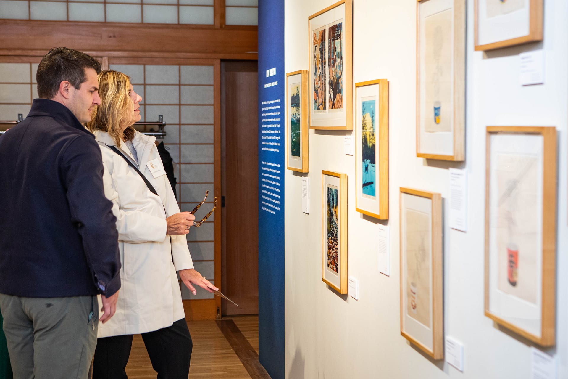 people looking at art