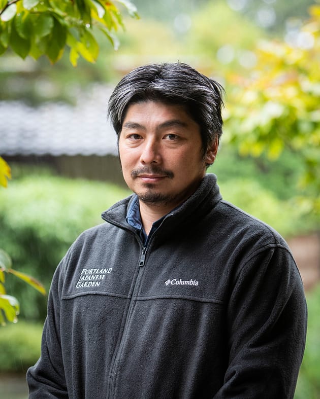 A photo of Portland Japanese Garden's Garden Curator, Hugo Torii