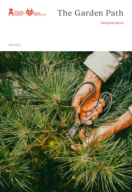 The front page of the fall 2025 issue of The Garden Path. It features a close-up image of two hands pruning a pine.