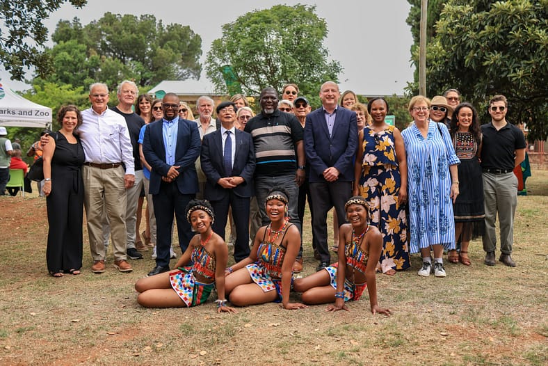 A large group from Portland Japanese Garden and Japan Institute along with local partners in Johannesburg, South Africa after the 2 organizations planted a tree there.