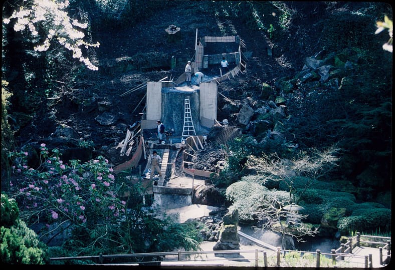 Massive repairs being made to a human-made waterfall in Portland Japanese Garden.