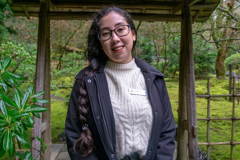 Chloe Lee, an intern and volunteer for Portland Japanese Garden, standing in the Tea Garden.