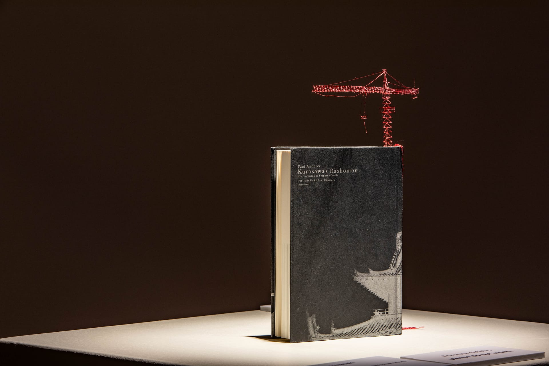 Tectonic Model (Book standing up with construction crane coming out)