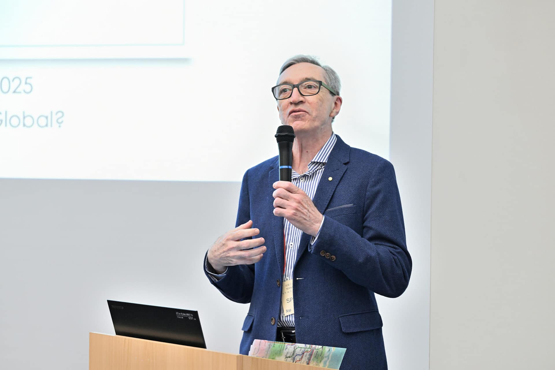 man speaking into a microphone