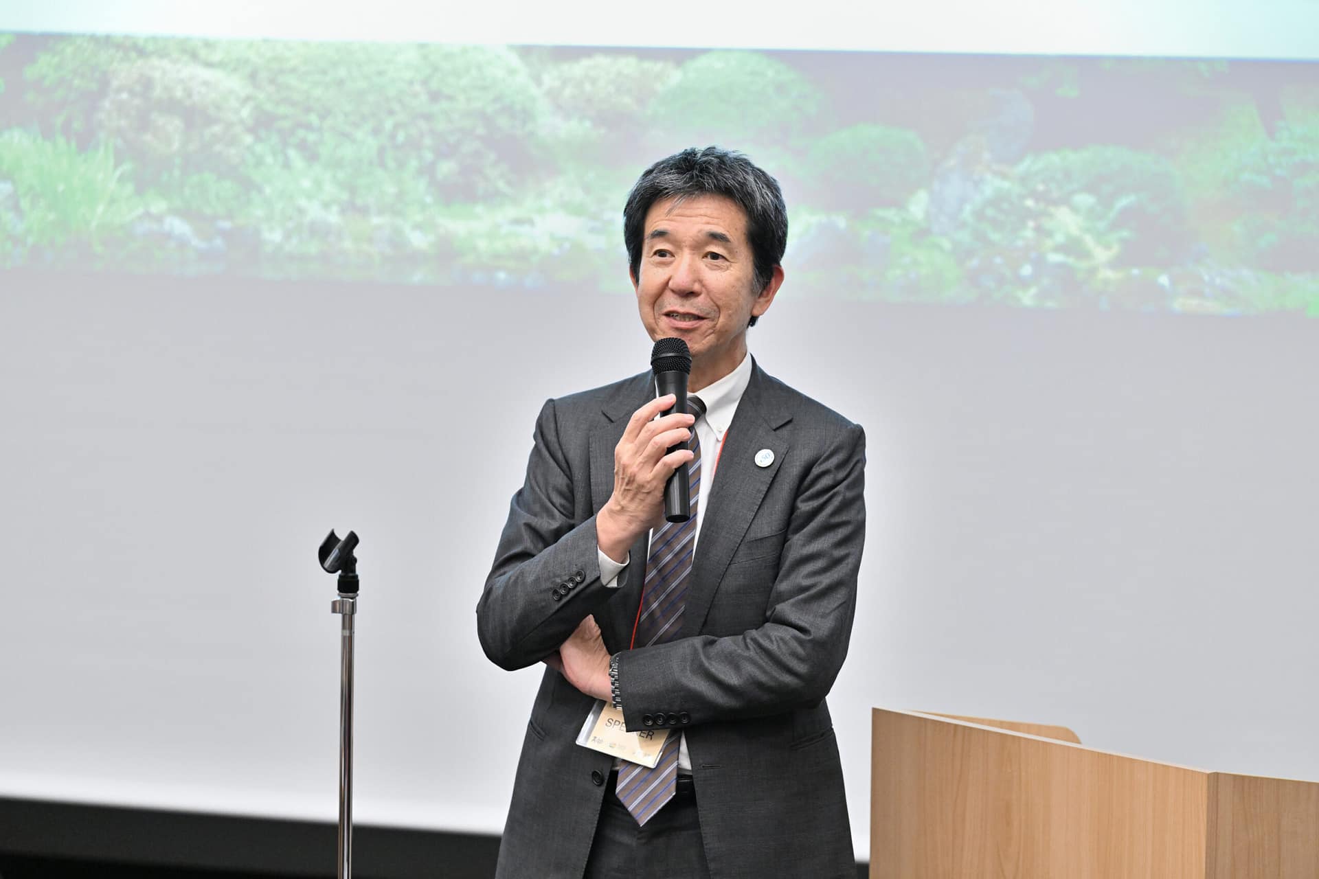 a man speaking into a microphone